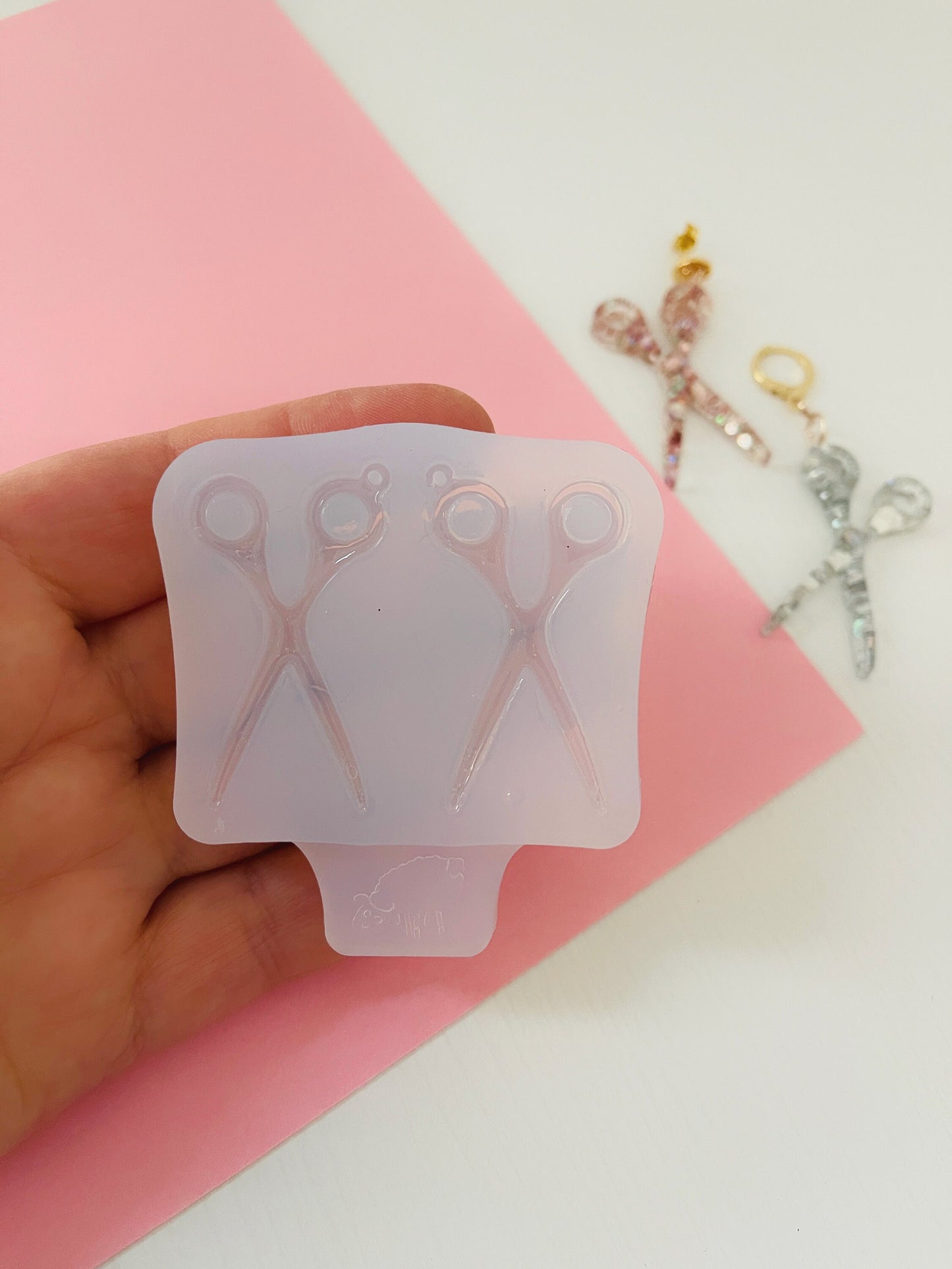 Silicone mold for earrings in the form of scissors. Mold for epoxy and UV resin. Glossy resin form. Rubber mold