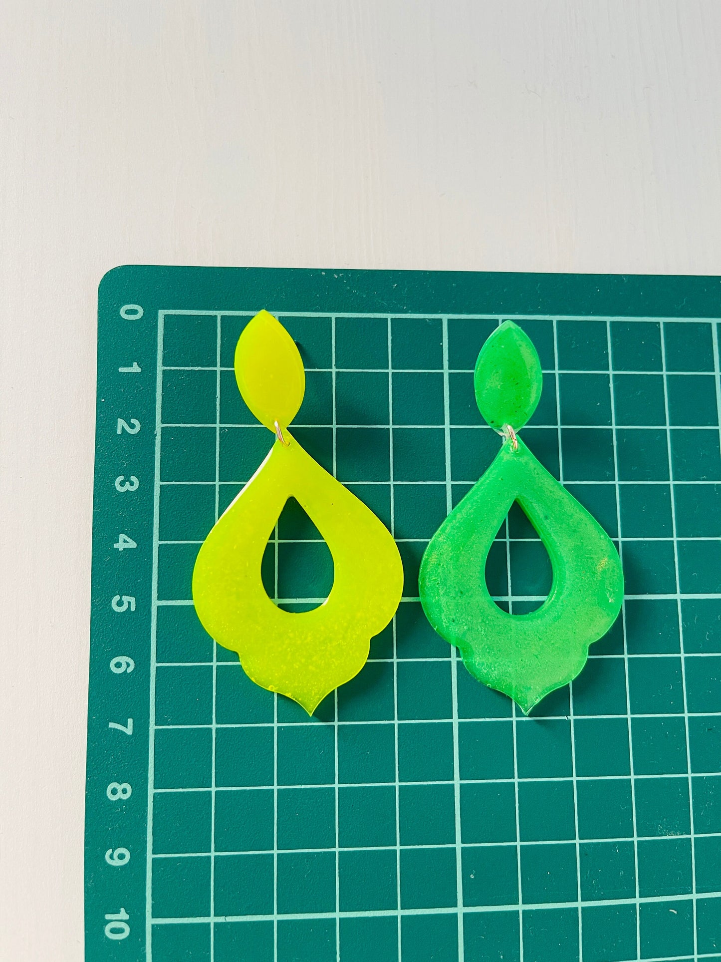 Silicone mold for making epoxy resin earrings.