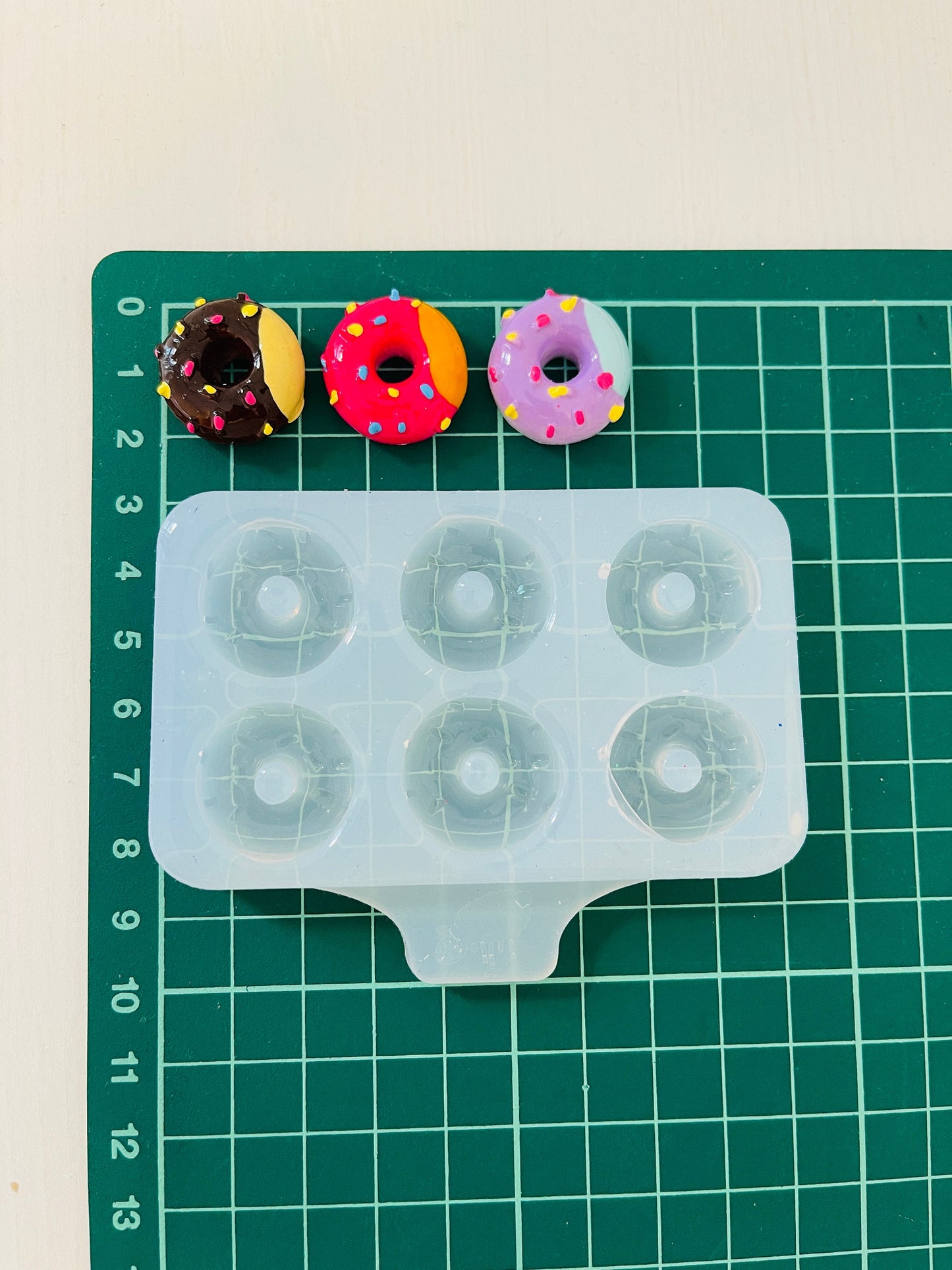 Silicone mold. Donut-shaped stud earrings. Mold for epoxy and UV resin. Super glossy resin form. Donut shaped jewelry earrings.