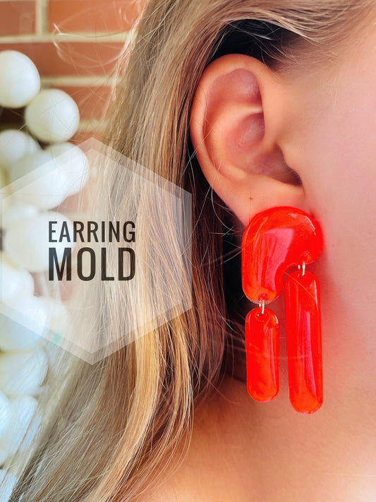 Mold for earringsin the form of oval