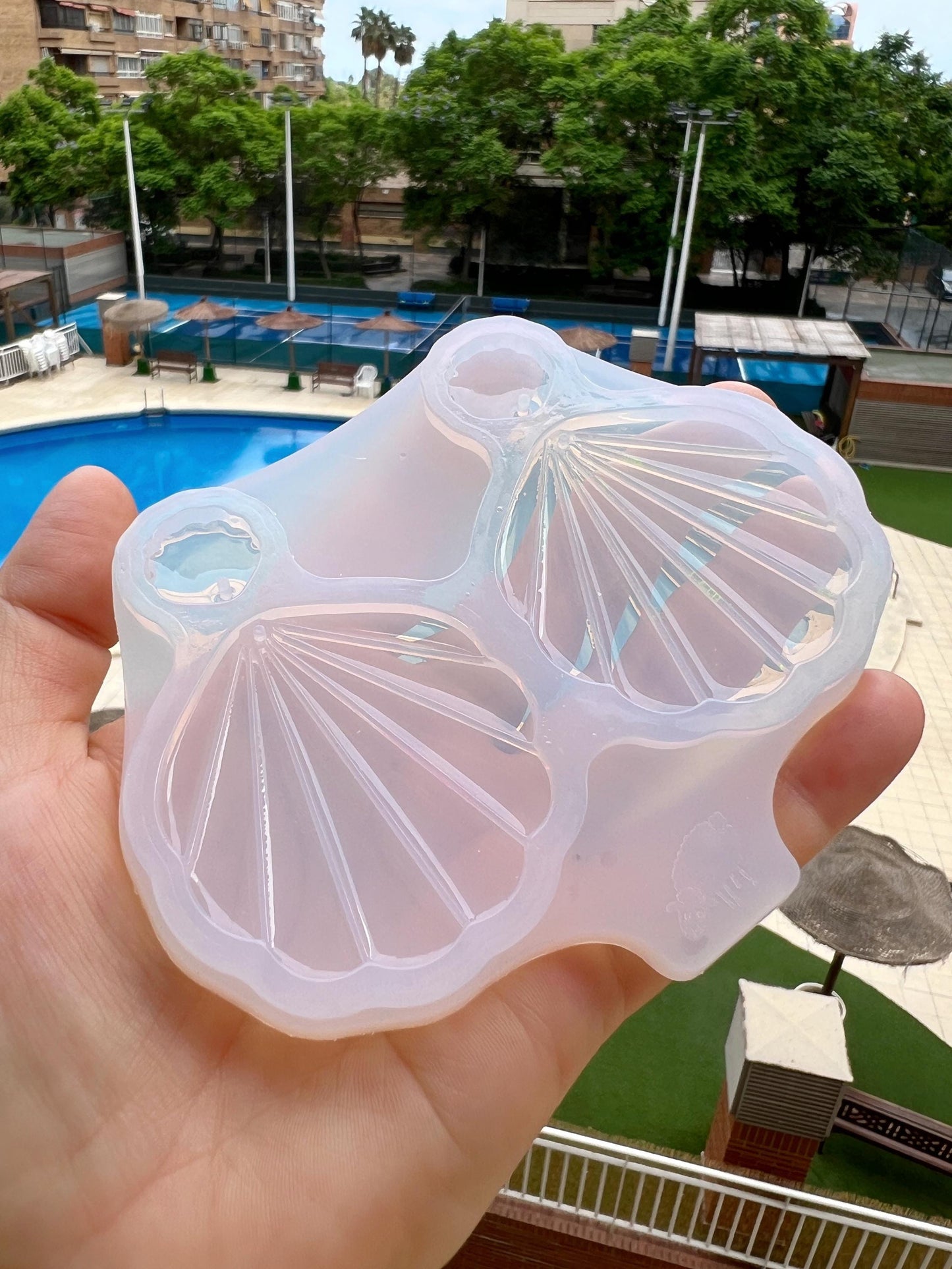Seashell. Silicone mold for making earrings from epoxy resin.